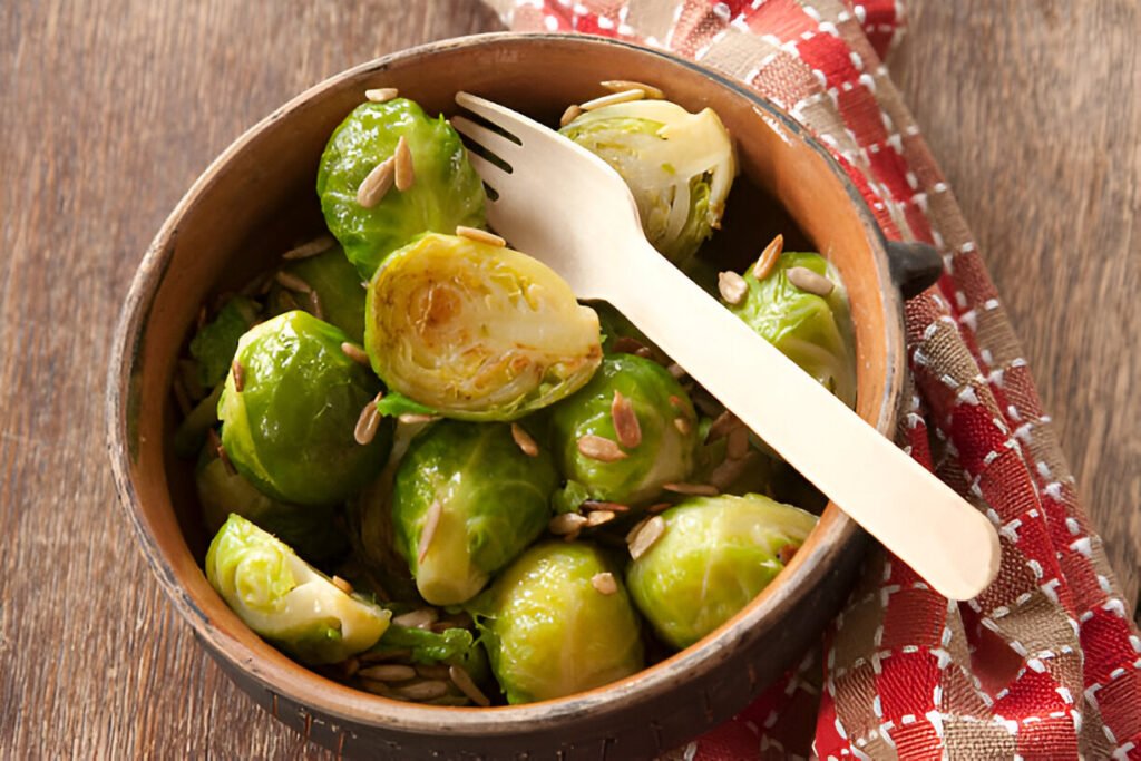 cooked brussels sprouts in rustic bowl